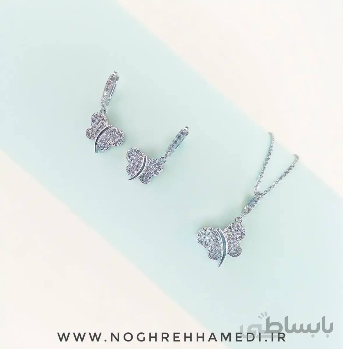 نیم ست نقره پر‌وانه NIB52
