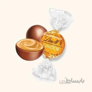 شکلات پذیرایی لینت مدل لیندور زرد شیری با طعم کارامل - کیلویی 250 گرمی
