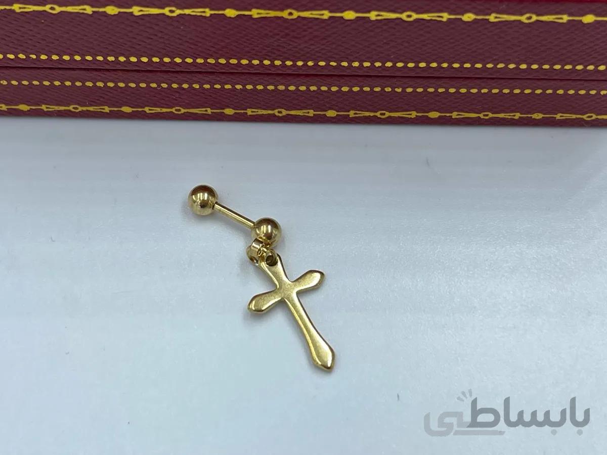 پیرسینگ گوش با آویز صلیب