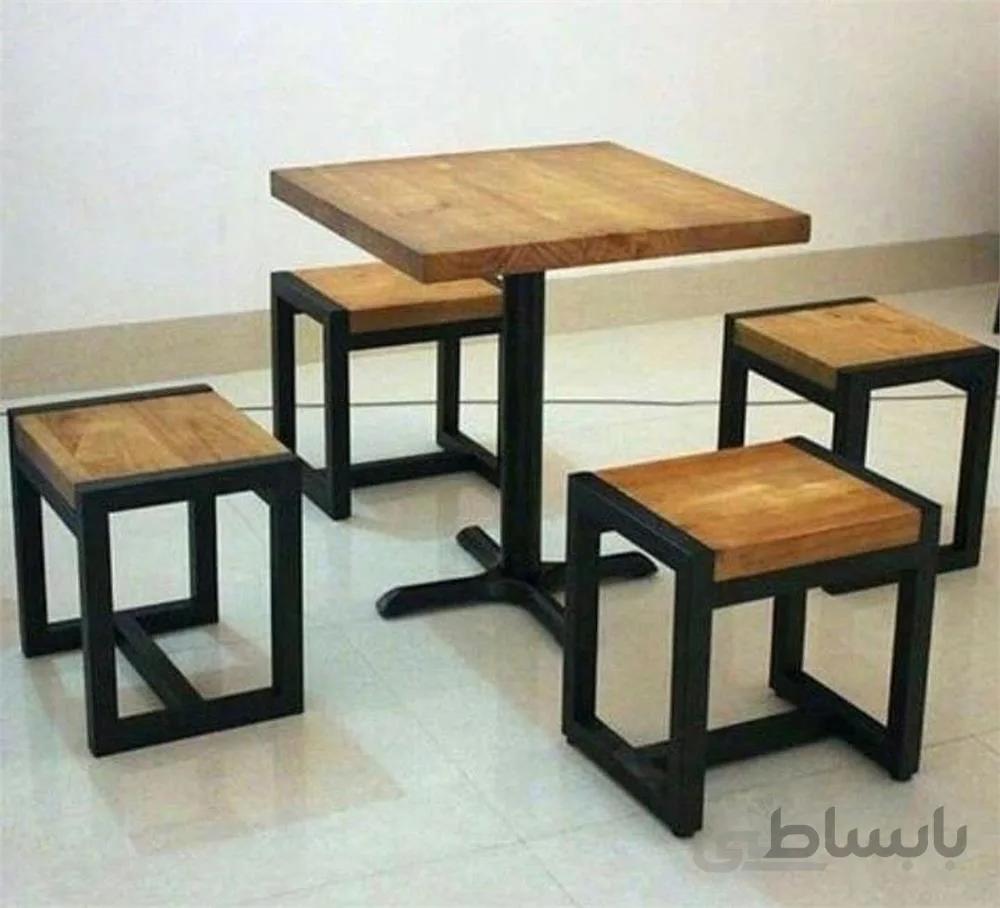 سرویس چهار نفره از میز و نیمکت ،تلفیق چوب و فلز ا Four-person set of tables and benches, a combination of wood and metal