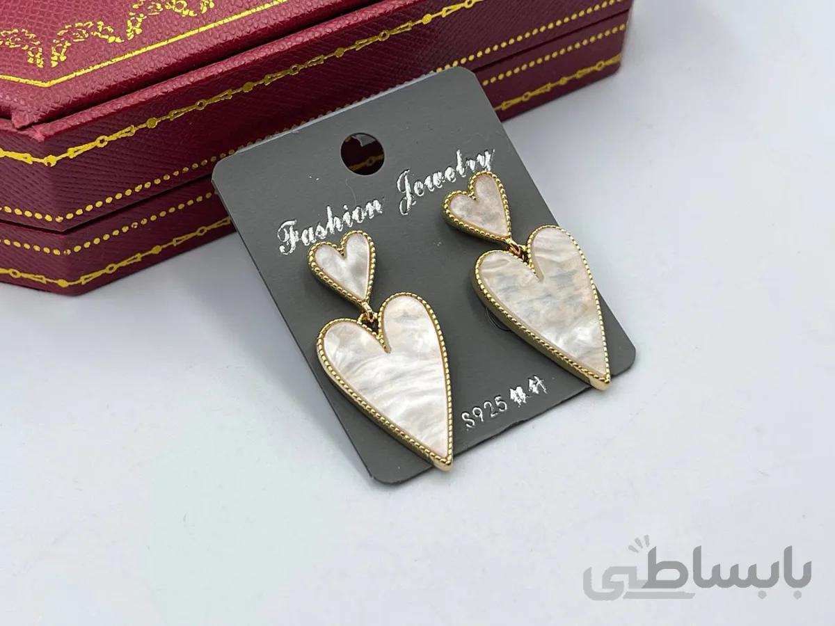 گوشواره صدفی با بک گراند ستاره