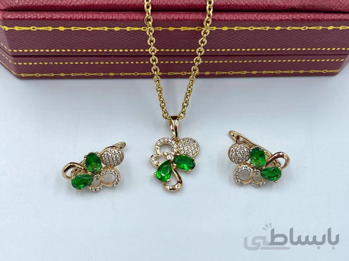 نیم ست گوشواره و گردنبند طرح گل با نگین سبز