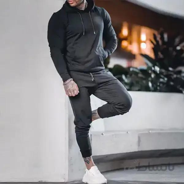 ست مردانه کد 133 هودی و شلوار اسلش جنس دورس رنگ مشکی ا Men's slash hoodie and pants set, simple sport design, made of black Dors