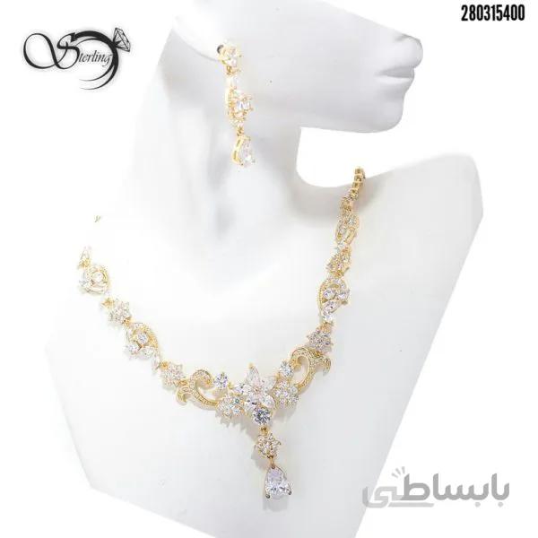 سرویس زنانه طرح طلا رنگ ثابت کد:۲۲۶۱