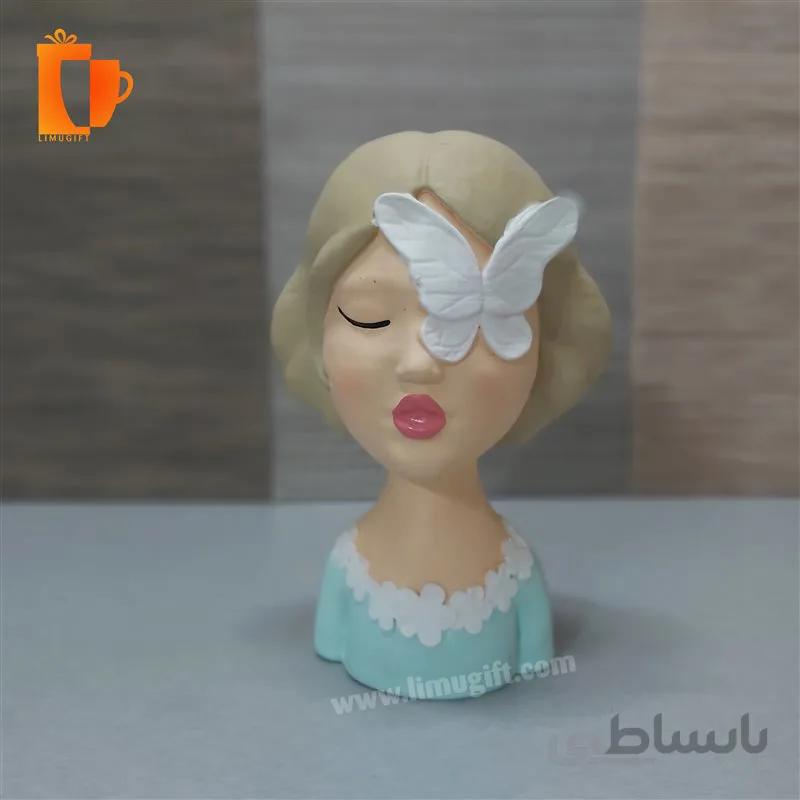 مجسمه پلی استری دختر چشم پروانه ای
