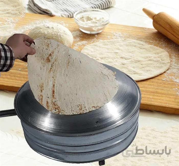 ساج گازی-تنور گازی خانگی تابه معمولی ا ساج گازی مخصوص پخت انواع نان دارای مشعل قابل تنظیم درجه حرارت دلخواه قابل استفاده از گاز خانگی و گاز سیلندر جنس ساج: ورق مقاوم گالوانیزه (ضد زنگ زدگی)