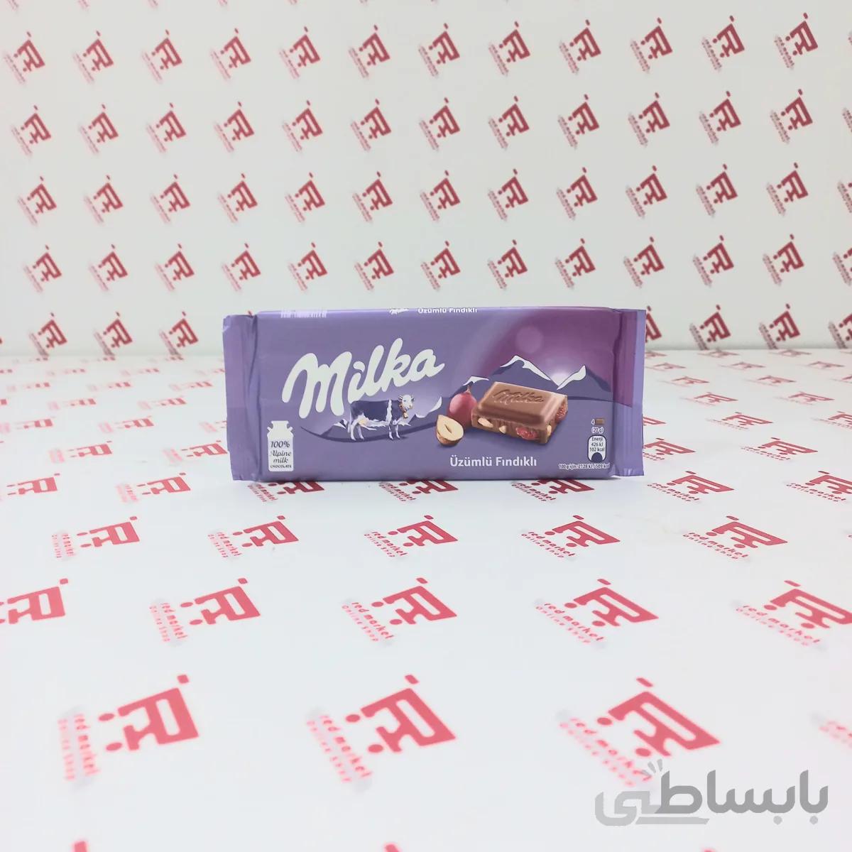 شکلات تخته ای میلکا با مغز فندق و انگور ۱۰۰ گرمی