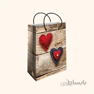 ساک کادویی کوچک طولی سایز 2 طرح دو قلب