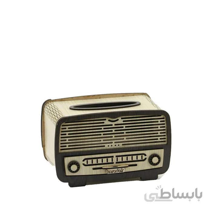 جا دستمال کاغذی طرح رادیو کد 1401 ا این کالا به شکل رادیو طراحی شده و دارای یک آنتن میباشد که این محصول را جذاب تر میکند و برای استفاده در مقابل میهمان ها و عزیزان خود بسیار زیبا است