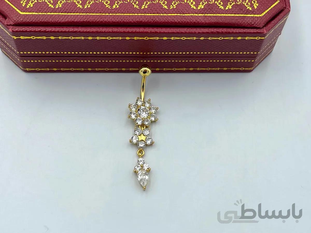 پیرسینگ ناف آویز دار طرح گل طلایی