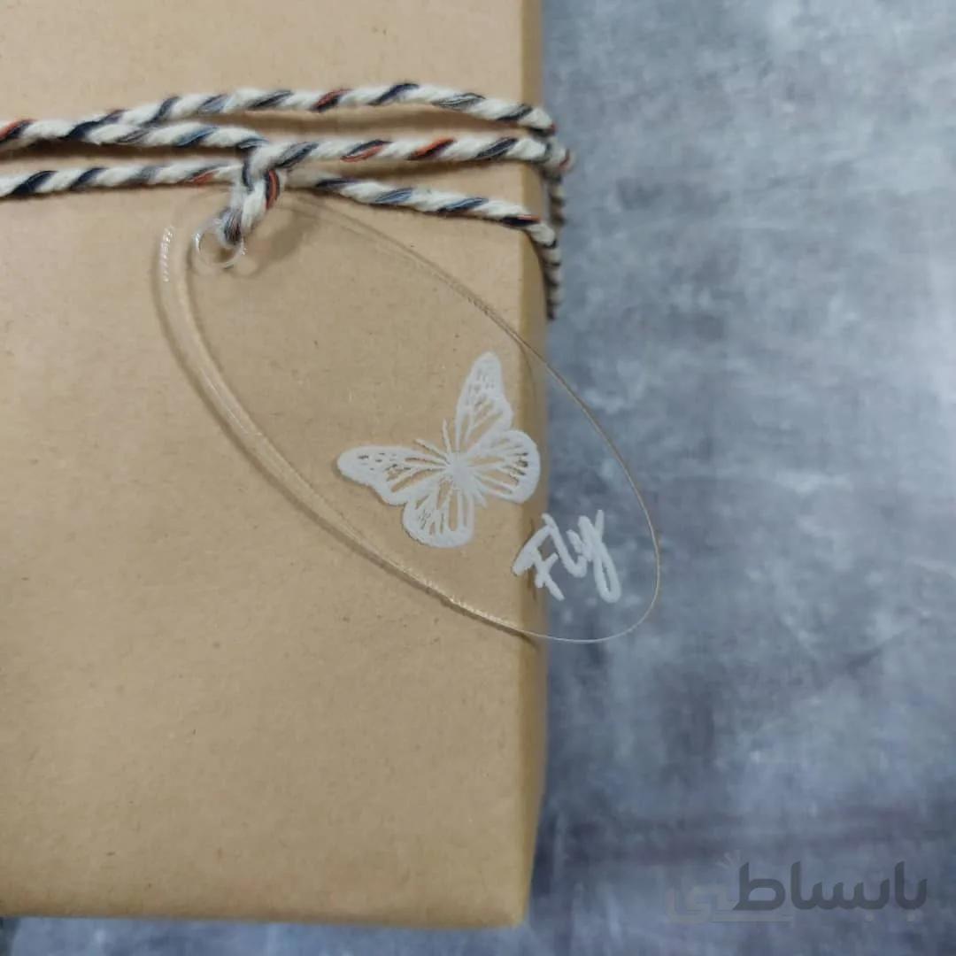 تگ شیشه ای پروانه