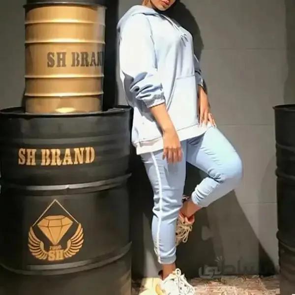 ست زنانه کد 214 هودی و شلوار طرح نوار تک خط جنس کتان کش رنگ آبی ا Women's set, code 214, hoodies and pants, single-stripe design, Dors blue color