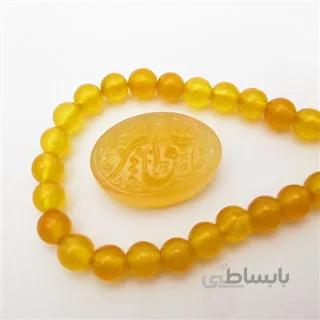 عقیق زرد با حکاکی یا علی اکبر کد 2953 ا قیمت به شرط خرید تیمی