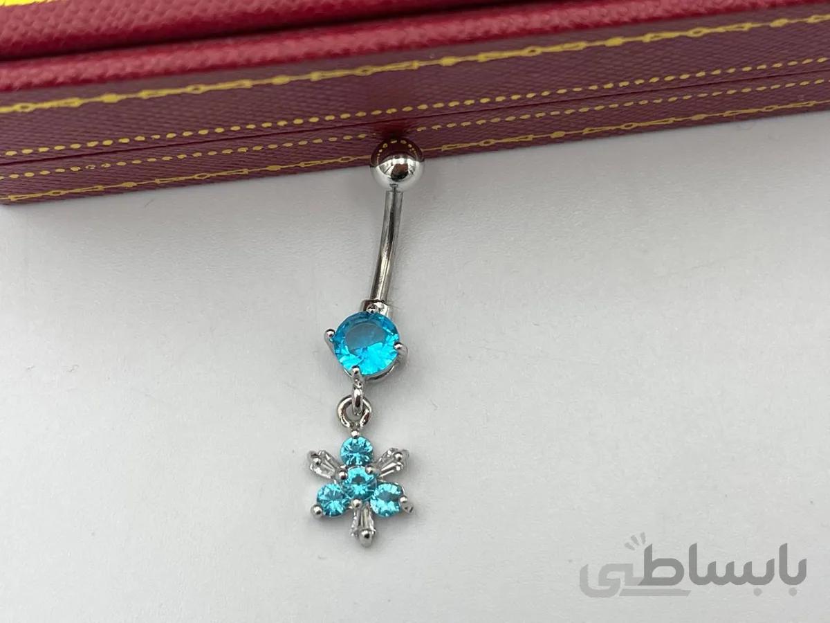 پیرسینگ ناف با نگین آبی فیروزه ای