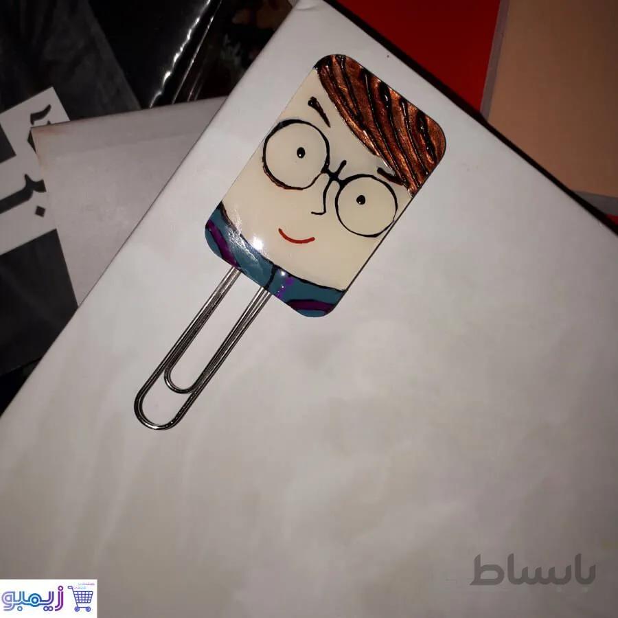 نشانگر کتاب پسرک درسخون