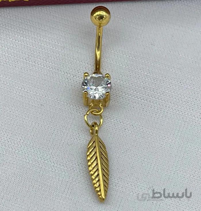 پیرسینگ ناف آویز دار طرح برگ طلایی