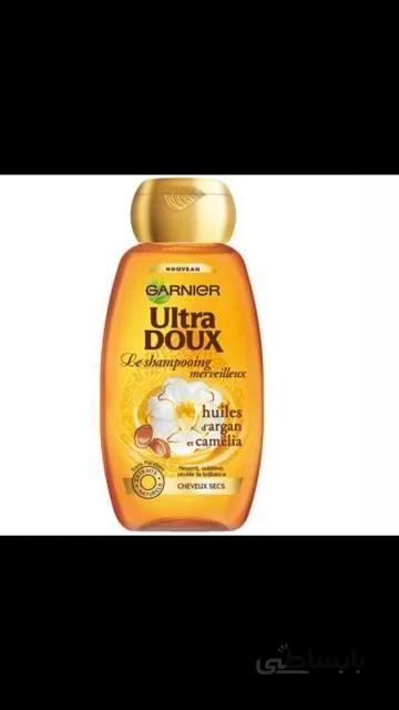 شامپو تقویت کننده مو گارنیه سری Ultra Doux مدل Argan Camelia حجم 250 میلی لیتر ا Garnier loving blends