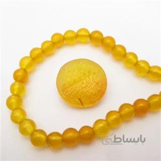 سنگ عقیق زرد با حکاکی و من یتق الله کد 2951 ا قیمت به شرط خرید تیمی
