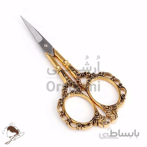 قیچی فانتزی گلدوزی و نیدل پانچ مدل گل طلایی