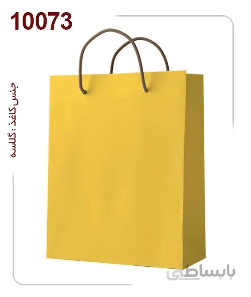 ساکدستی تک رنگ زرد با کاغذ گلاسه کد10073