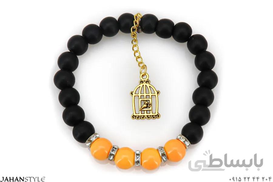دستبند مهره دار دو رنگ نگین دار