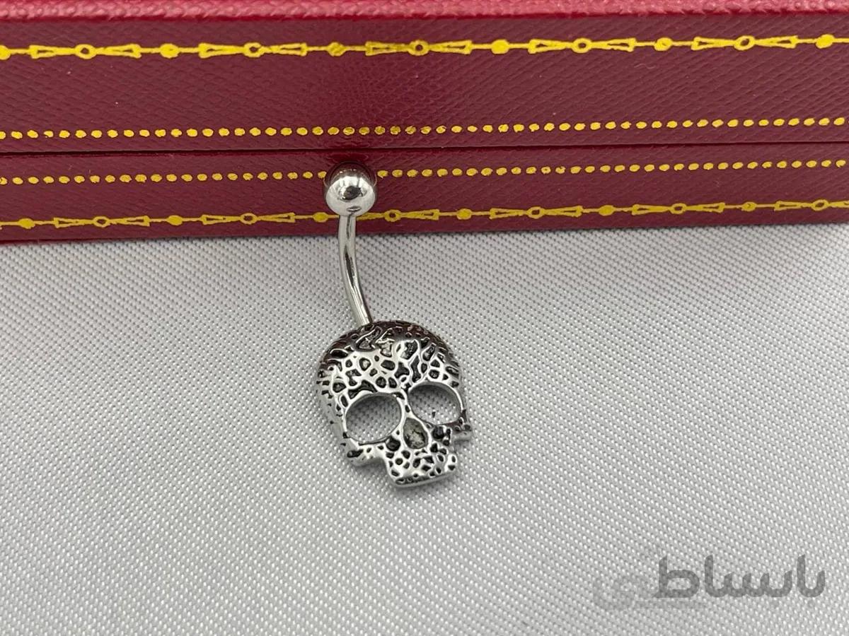 پیرسینگ ناف جمجمه نقره ای