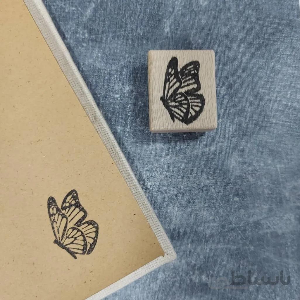 مهر طرح پروانه نشسته