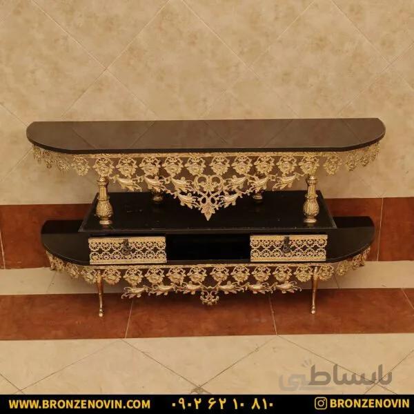 میز تلویزیون برنزی طرح خم صفحه هایگلاس تسمه گل رز تاج دار