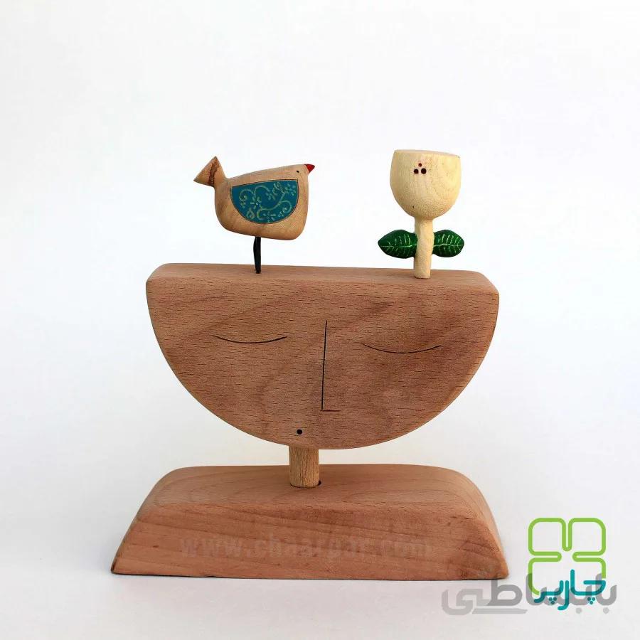 مجسمه جوجه به سر