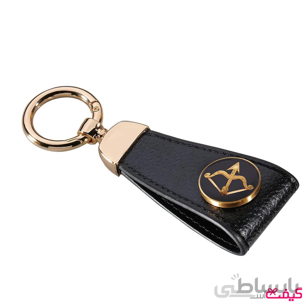 جاسوئیچی طلا و چرم ماه آذر (بند مشکی)