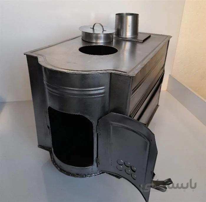 بخاری هیزمی سه منظوره (بخاری-کباب پز-غذاساز) ا این بخاری علاوه بر گرمایش عالی که دارد به عنوان کباب پز و غذاساز قابل استفاده است . با نصب دودکش بخاری کل دود از طرق دودکش به بیرون هدایت میشود . بهترین گزینه برای گرمایش خانه باغ میباشد .