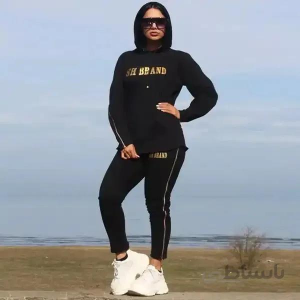 ست زنانه کد 229 هودی و شلوار طرح بغل زیپ دار طلایی رنگ مشکی