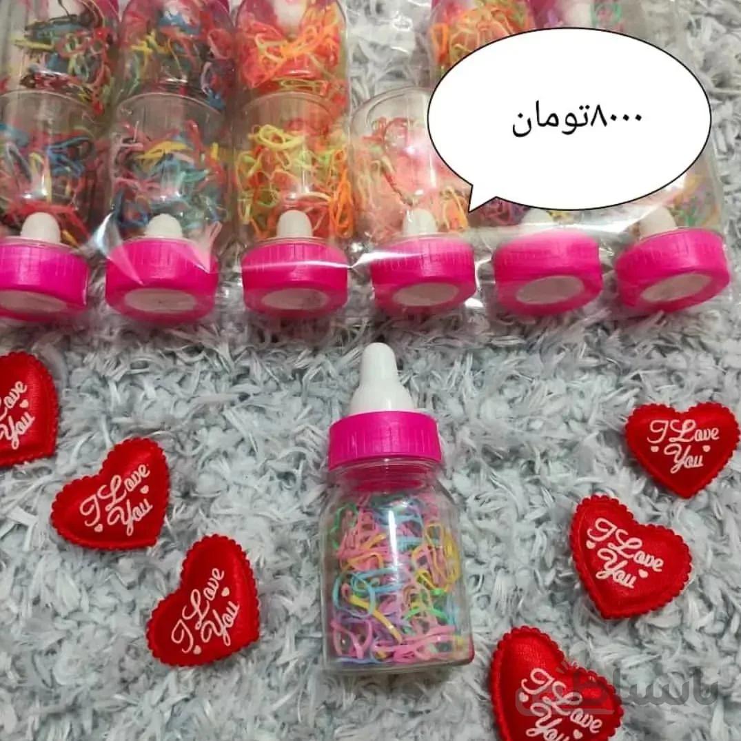 کش موی سر فانتزی بچه گانه دارای کش های رنگی داخل هر پک