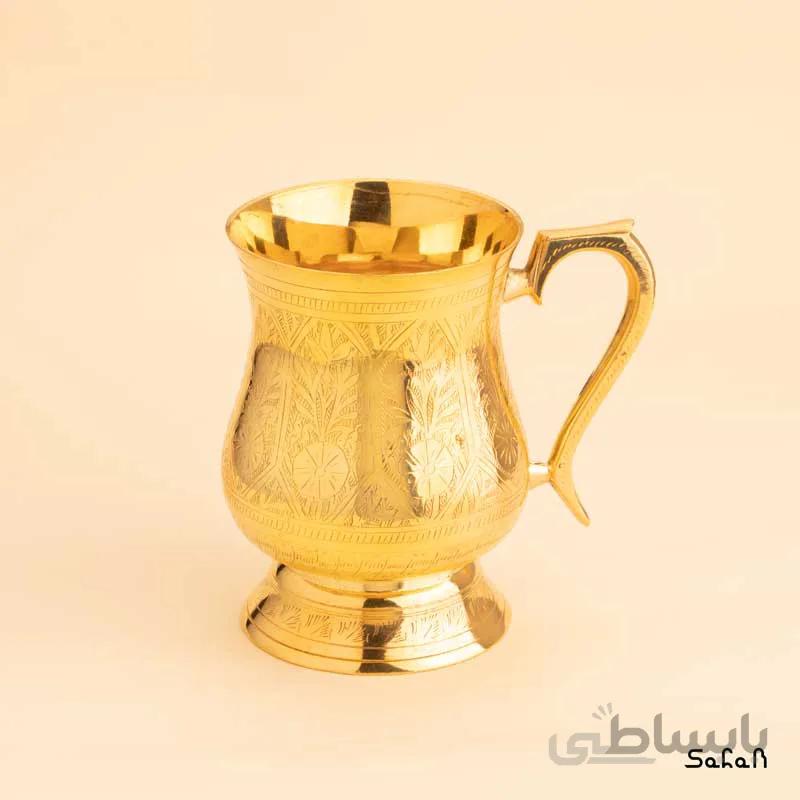 لیوان برنجی قلمزنی طلایی دسته دار پایه دار کد 306252