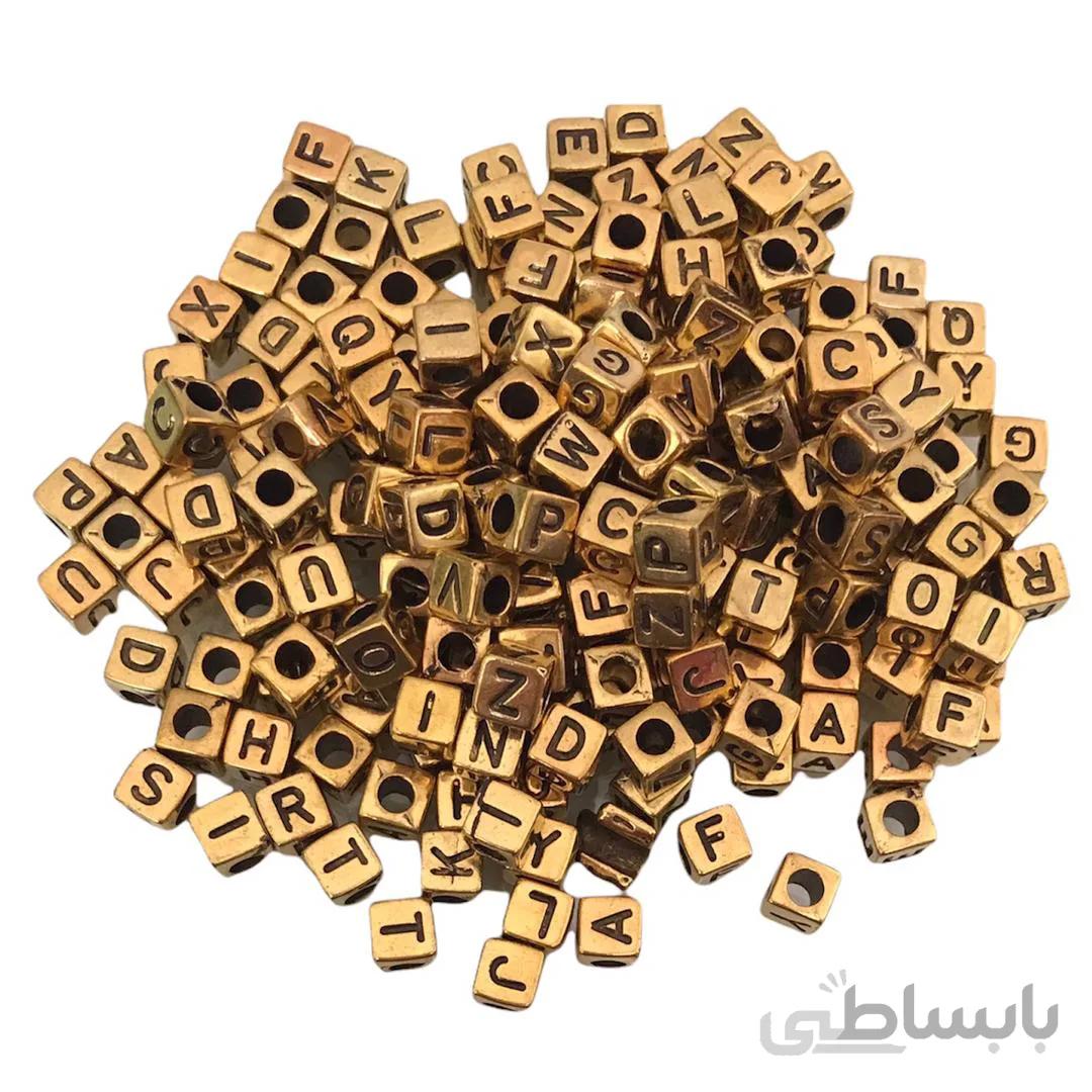 مهره دستنبد حروف انگلیسی طرح مکعبی (طلایی) بسته 200 عددی
