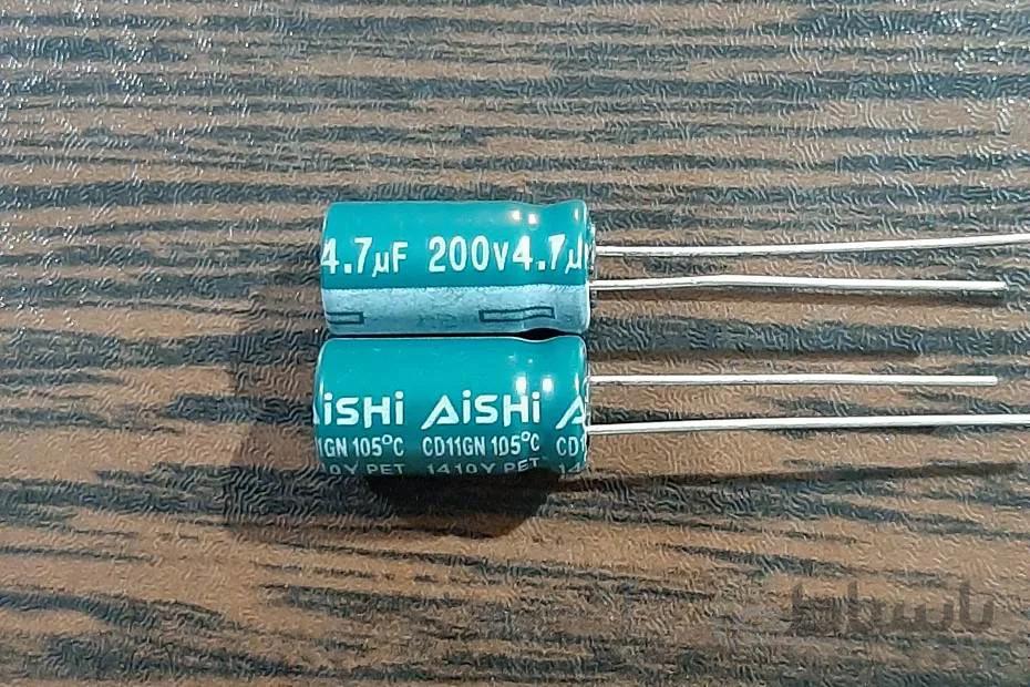 AiSHi 200V 4.7uF – خازن الکترولیت، ۲۰۰ ولت، ۴.۷ میکروفاراد