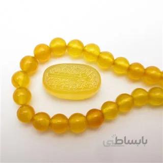 عقیق زرد با حکاکی و من یتق الله کد 2980 ا قیمت به شرط خرید تیمی