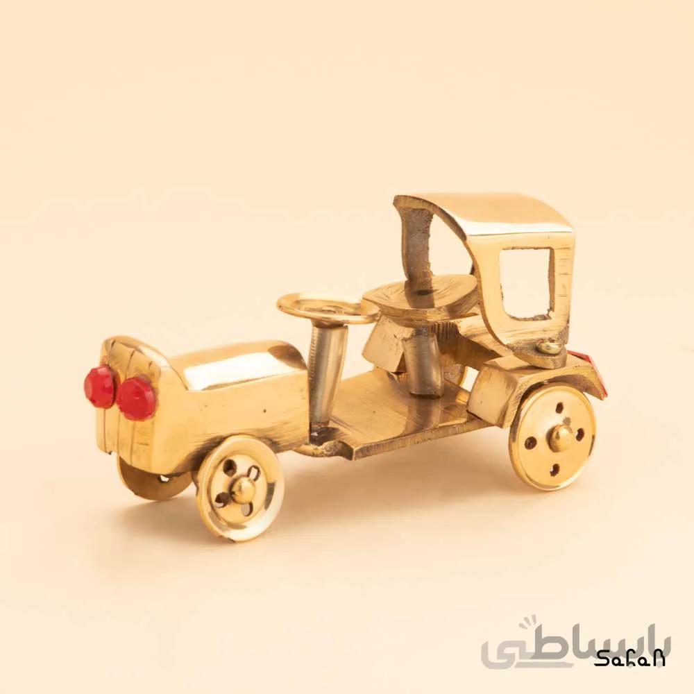 مجسمه برنجی طلایی مدل ماشین چنای