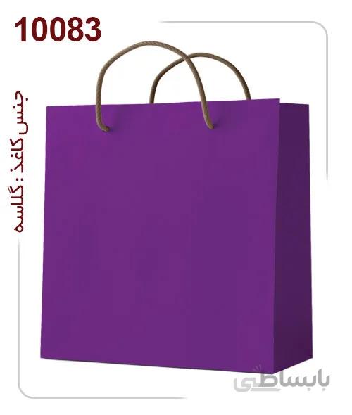 ساکدستی فانتزی تک رنگ بنفش با کاغذ گلاسه کد10083