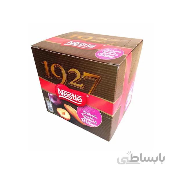 شکلات تلخ 1927 نستله با مغز کشمش ، فندق و بادام 65 گرمی بسته 6 تایی