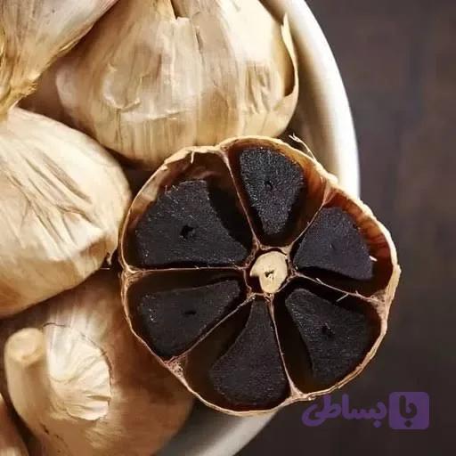 سیر سیاه درشت صادراتی 1 کیلو (تخمیر 90 روز، بدون گاز گوگرد) — تصویر 1