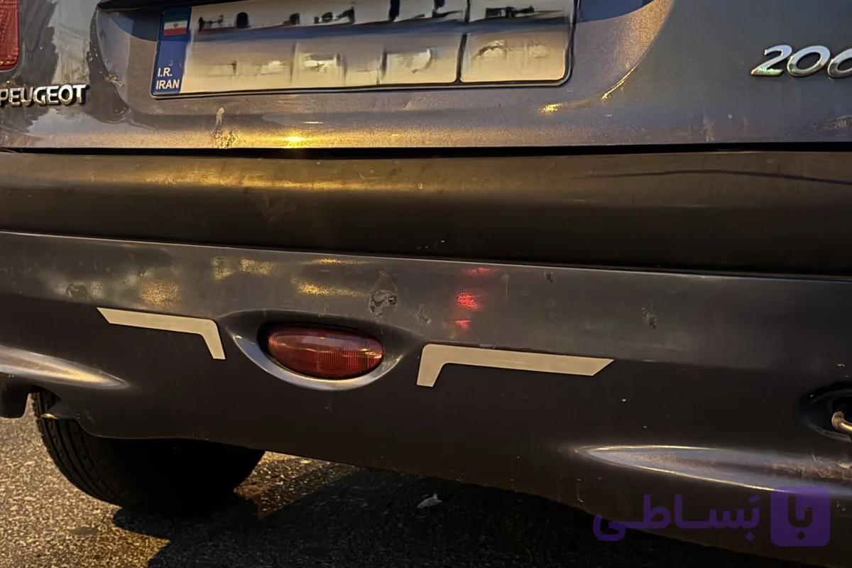زه تزیینی سپر عقب پژو 206 ( قاب کنار مه شکن )