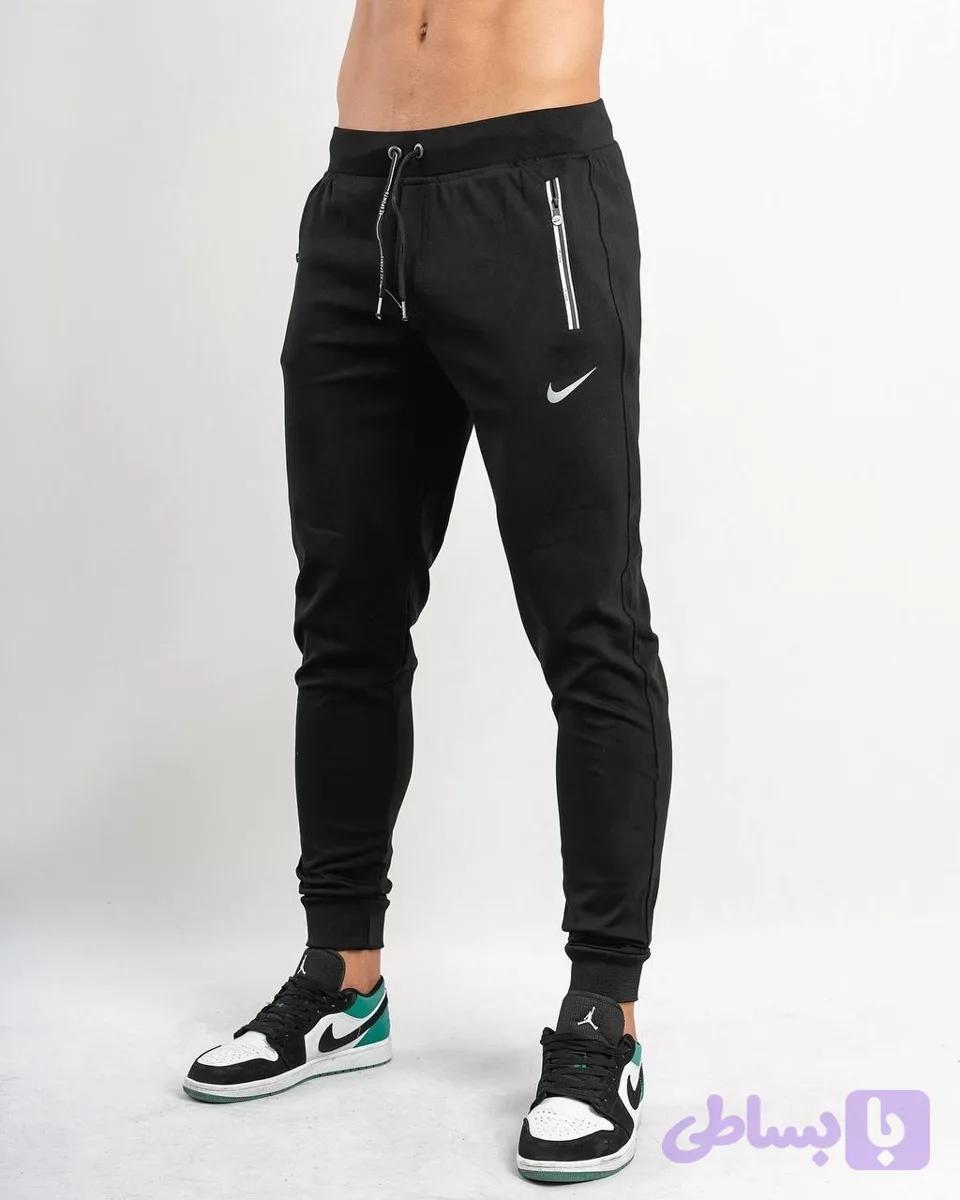 شلوار ورزشی مردانه مدل NIKE دمپاکش پارچه غواصی درجه یک خارجی جیب دار زیپ واتر در 2 رنگ جذاب