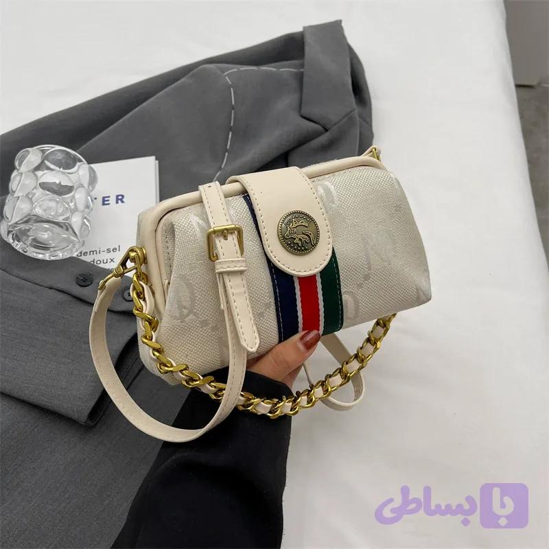 کیف دکمه سکه ای طرح کوچ