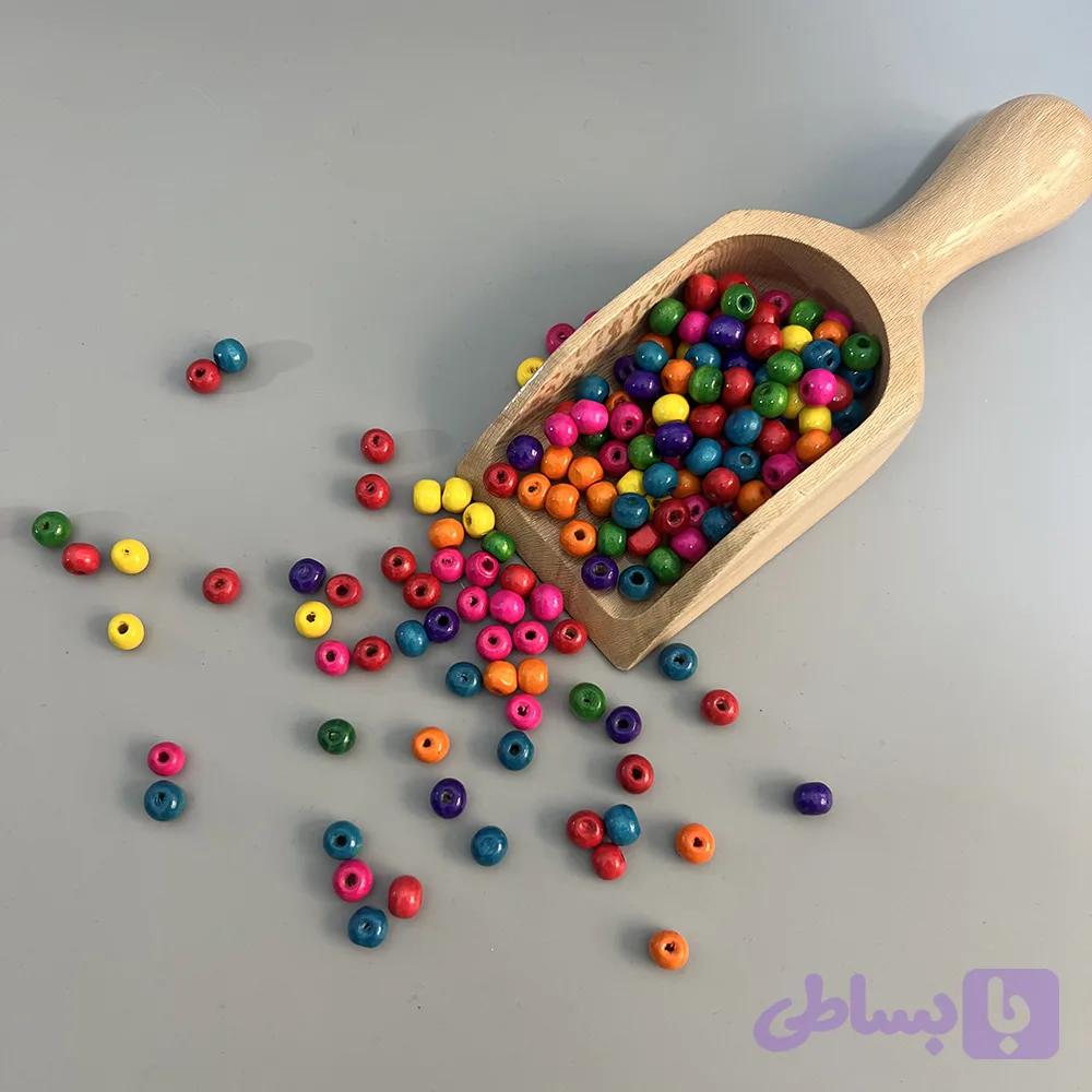 مهره چوبی رنگی — تصویر 1