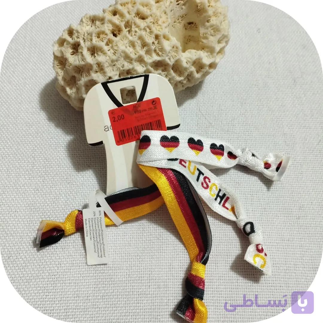 دستبند کشی پارچه ای و قفللی طرح پرچم آلمان برند accessories