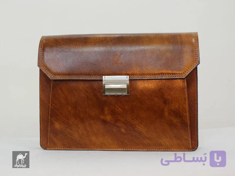 کیف کلاسوری قفل نقره ایی — تصویر 1