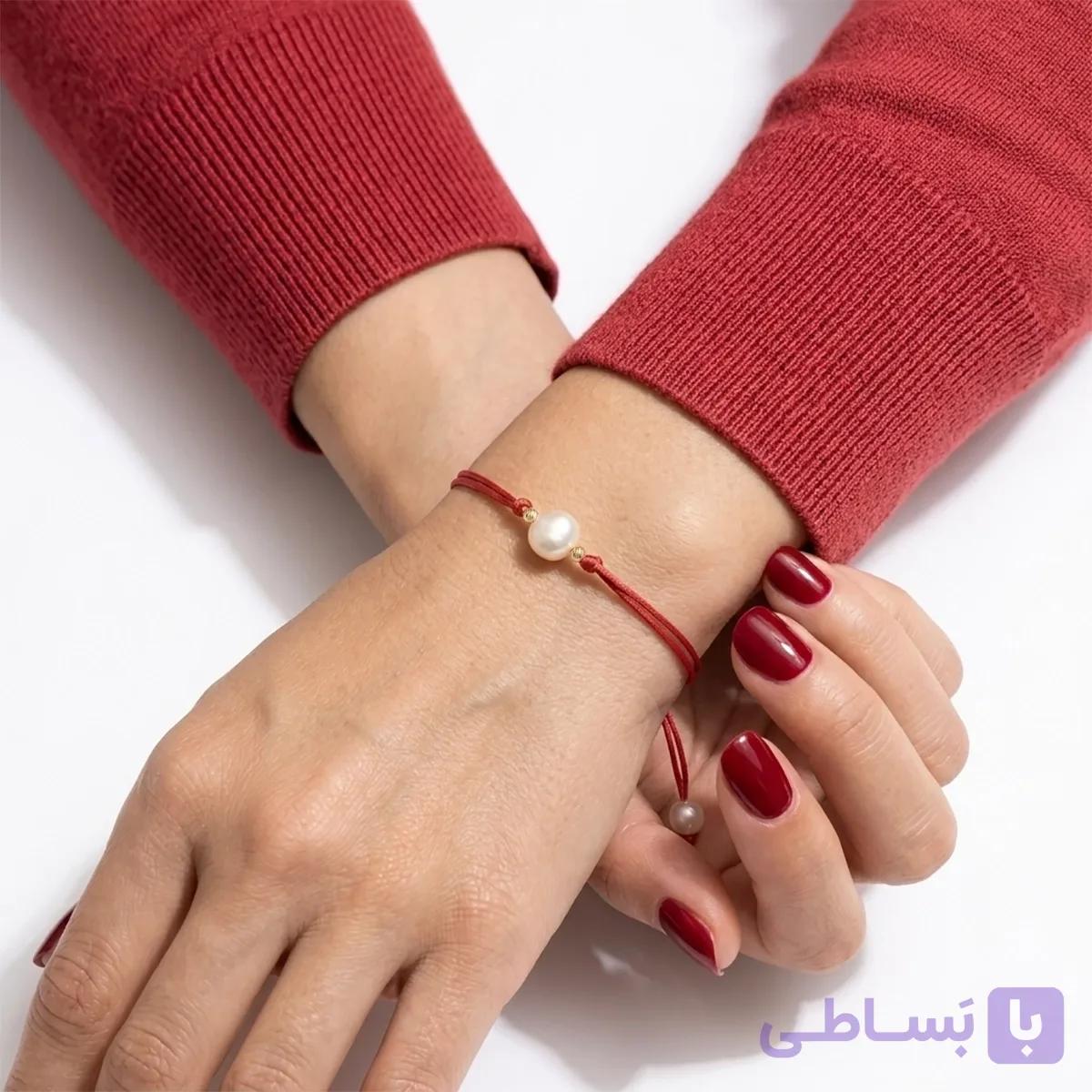 دستبند طلا و نخ البرنارد و مروارید — تصویر 1