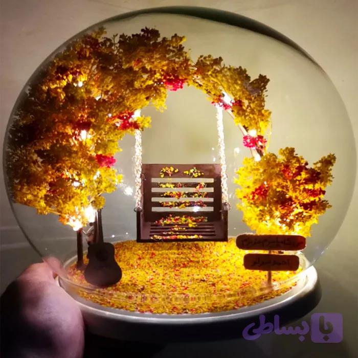 گوی شیشه ای چراغ دار دستساز درخت طبیعی بهاری طرح تاب — تصویر 1