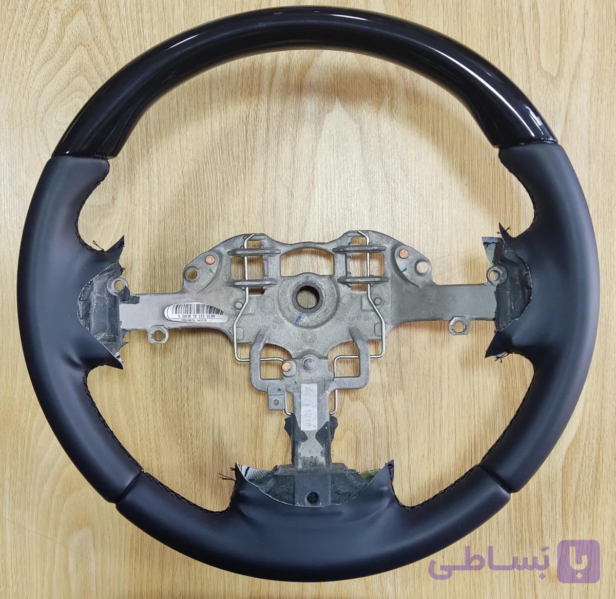 غربیلک فرمان چوب و چرم پیانویی (خودرو 207) — تصویر 1